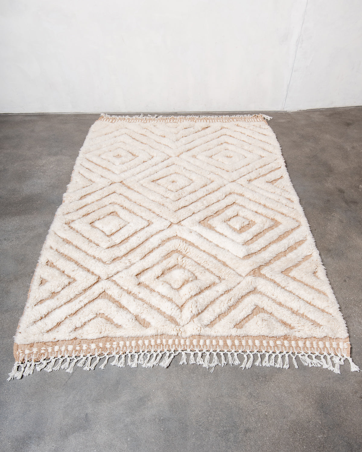 Modern, designer, handcrafted Berber rug from Morocco. Beniourain carpet with beautiful colours and patterns and fluffy wool texture.